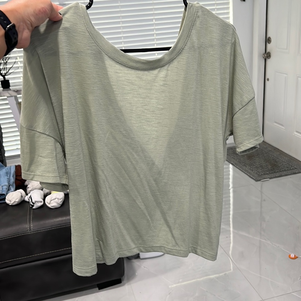 Green everyday tee. Cross back.
